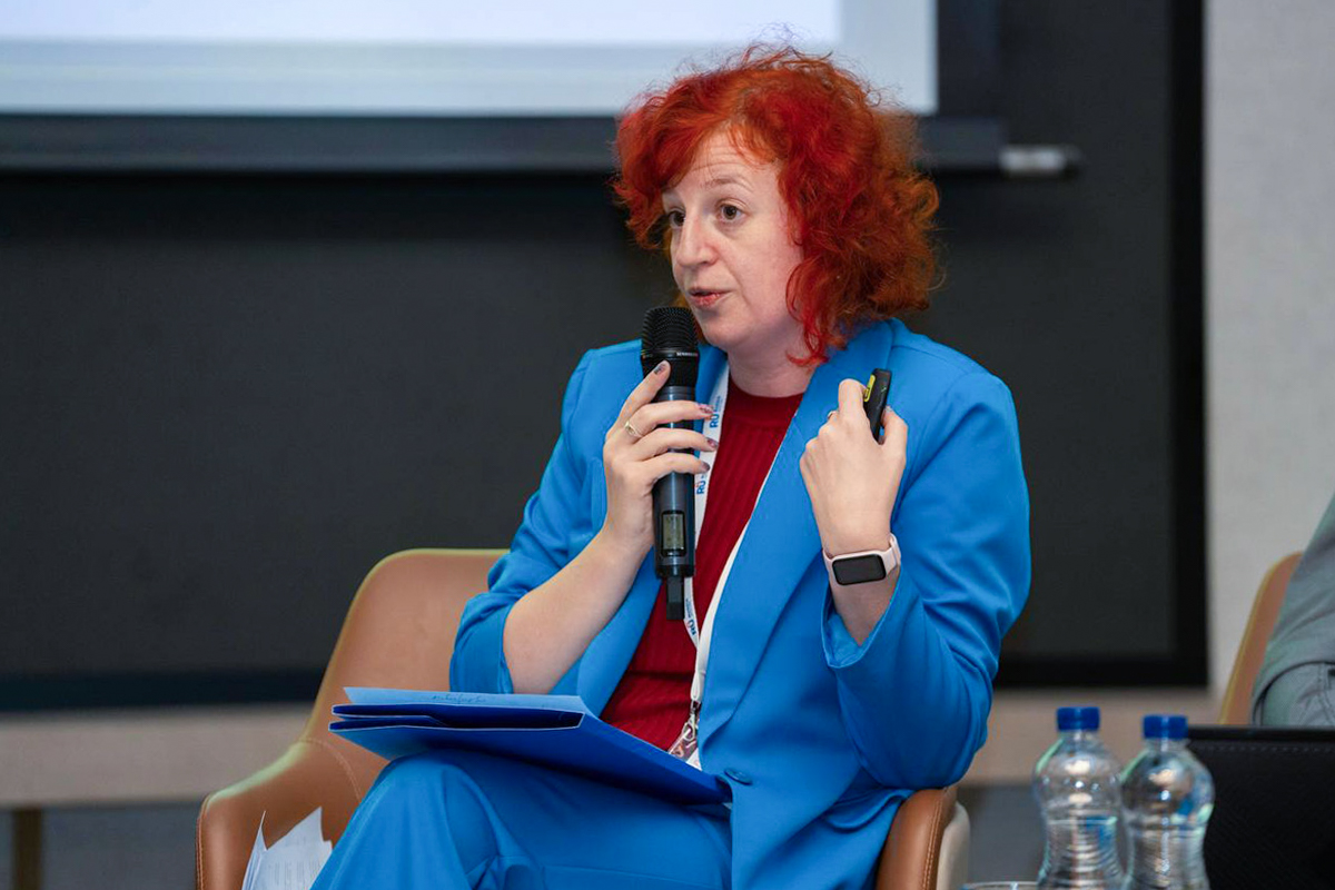 Irina Timoshenkova made a presentation (photo from the Rossotrudnichestvo website) 