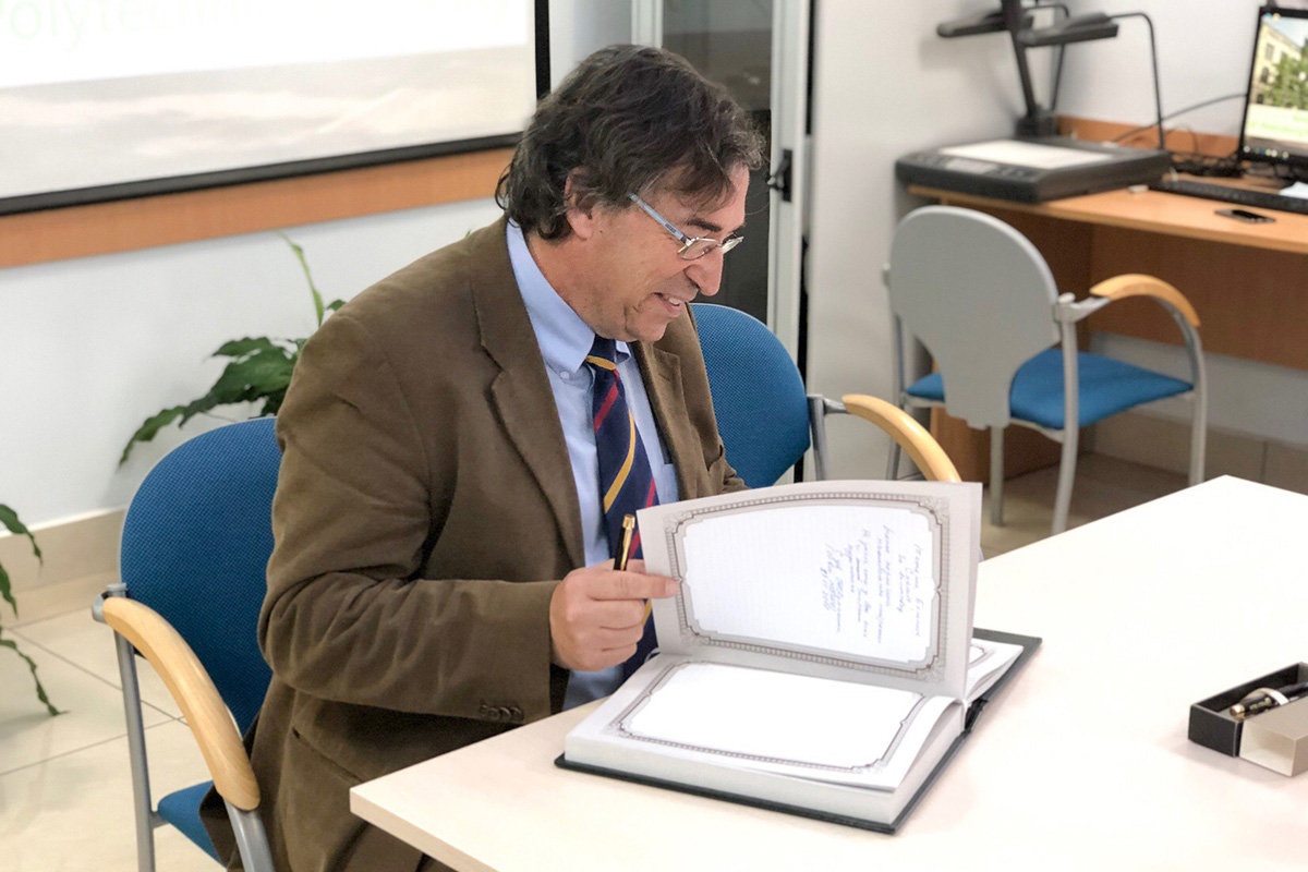 Vice-Rector for International Relations of BarcelonaTech Juan Jesus Perez signing the SPbPU Distinguished Visitors Book 